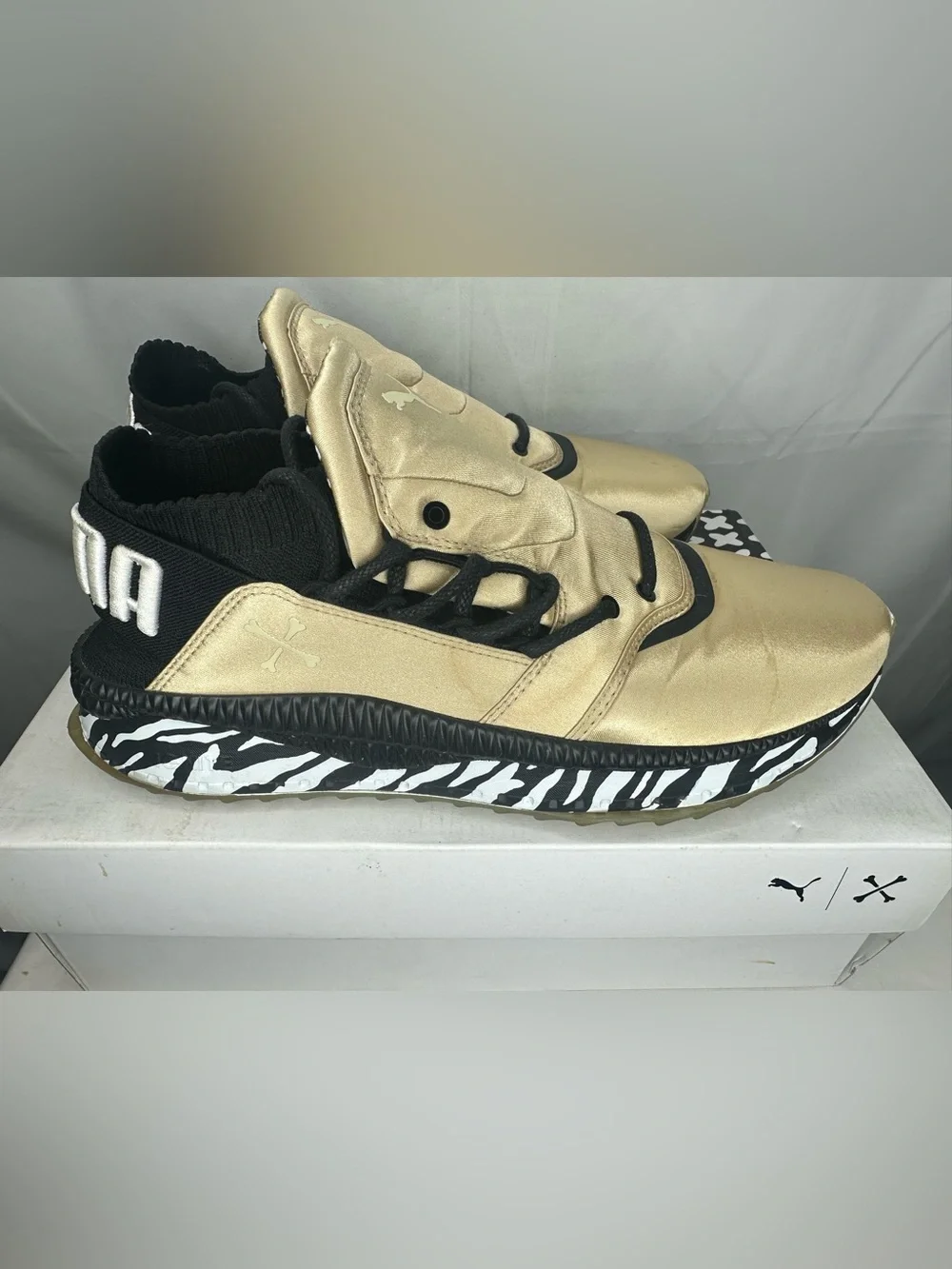 Puma Metallic Gold Sneakers with Black Details
